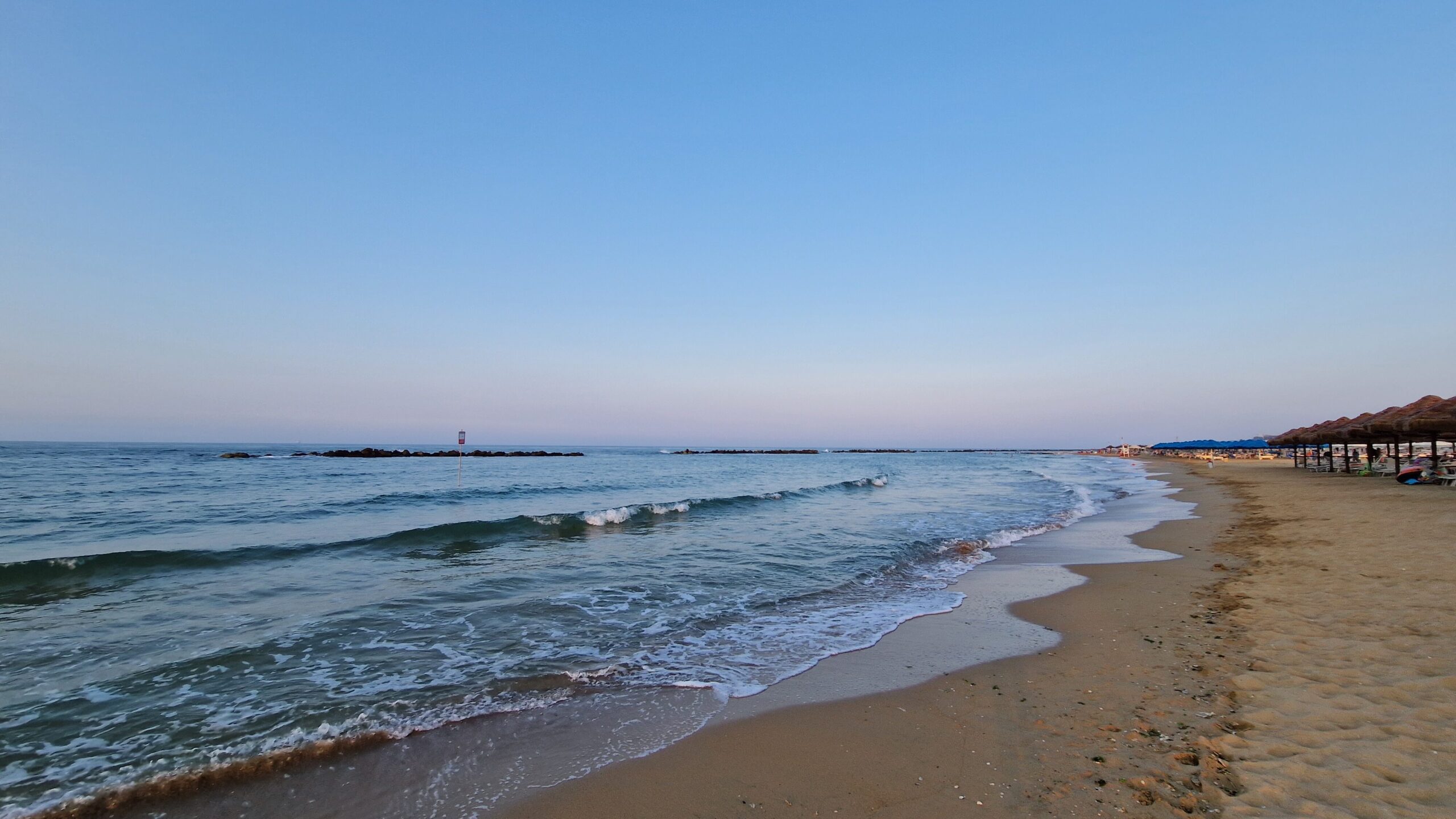 Budget Breakdown: Cost of Motorcycle Touring Through Italy Italian coast line after a long day of motorcycle touring