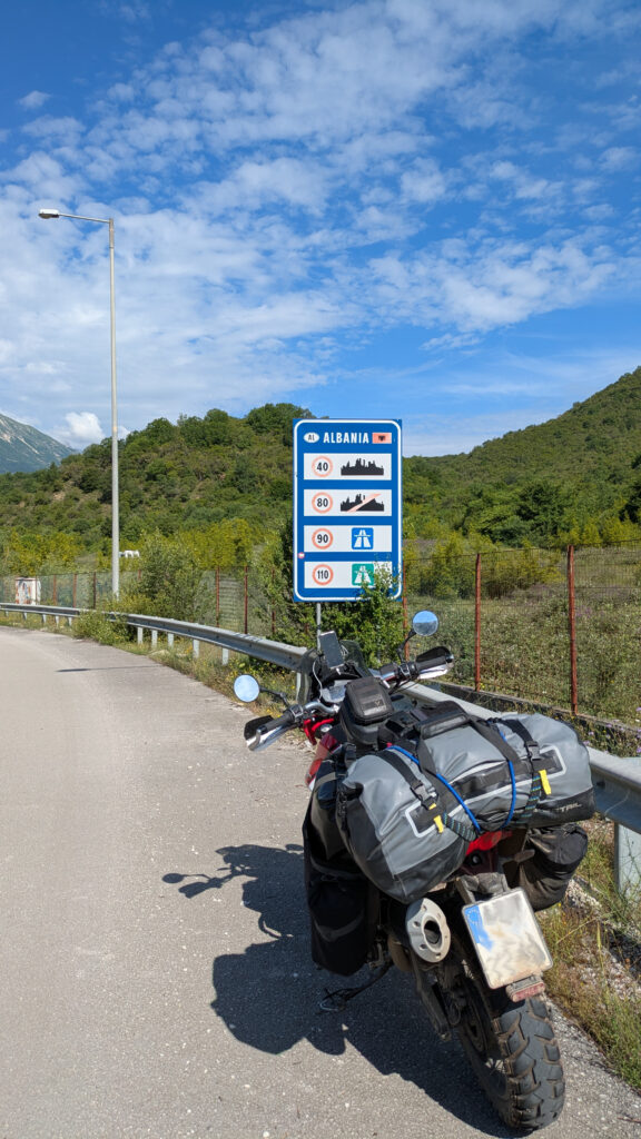 Albania Motorcycle Travel Guide: The Balkans' Hidden Gem Albania Border Crossing Motorcycle Sukobin Muriqan 576x1024