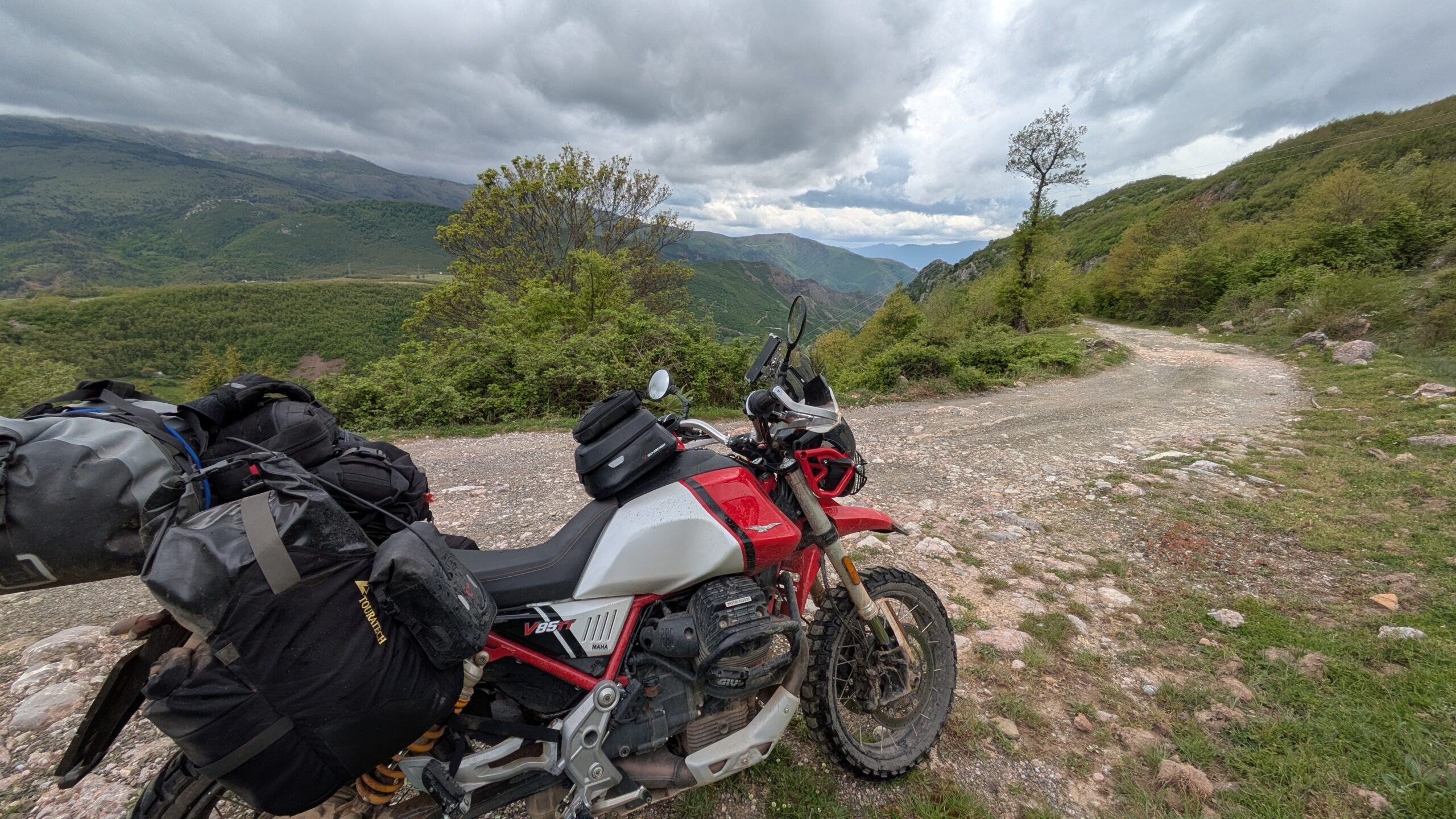 Albania Motorcycle Travel Dramatic Mountain Road Scaled