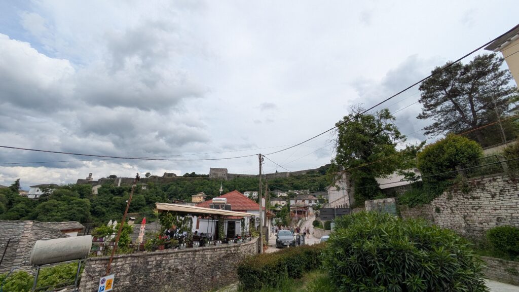 Albania Motorcycle Travel Guide: The Balkans' Hidden Gem Gjirokaster Albania Ottoman City Castle Motorcycle Stop 1024x576