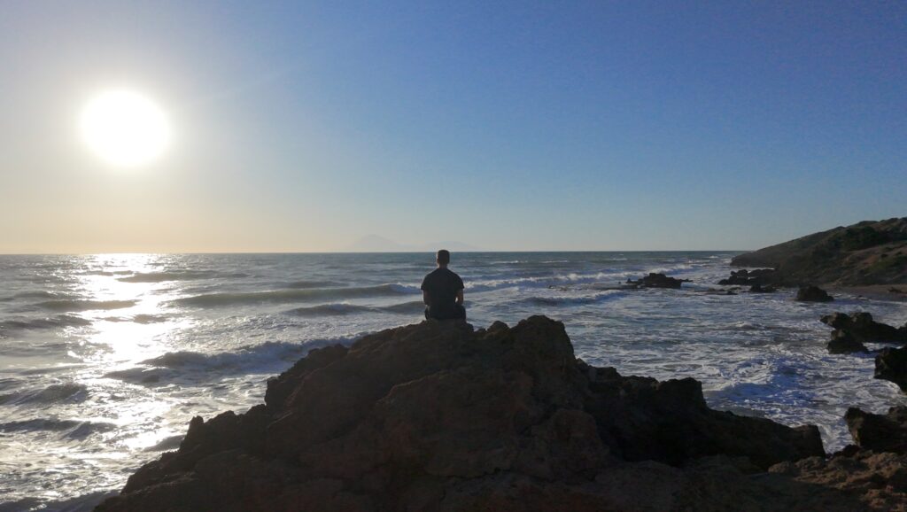 Dramatic rider silhouette at golden hour showing backlit rider and 
with rim lighting on edges