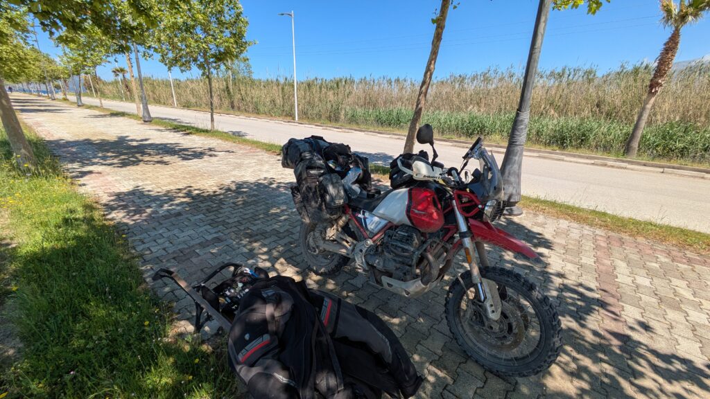 International Motorcycle Travel in Europe: Complete Guide Motorcycle being repaired at roadside in rural European location showing problem solving and self sufficiency of international motorcycle travel