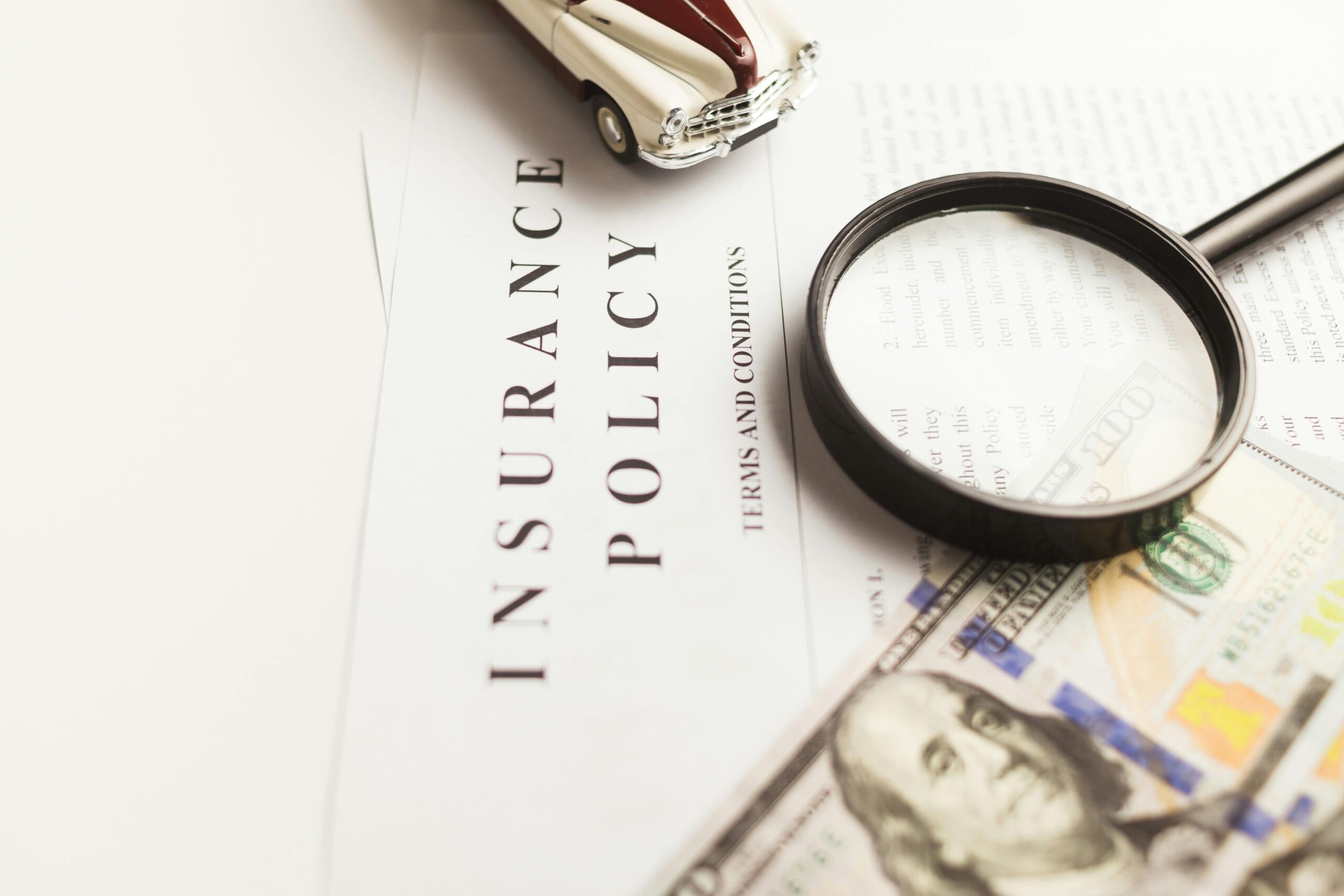 Trip Planning Motorcycle travel insurance documents laid out including green card insurance certificate and registration for european touringMotorcycle travel insurance documents laid out including green card insurance certificate and registration for european touring