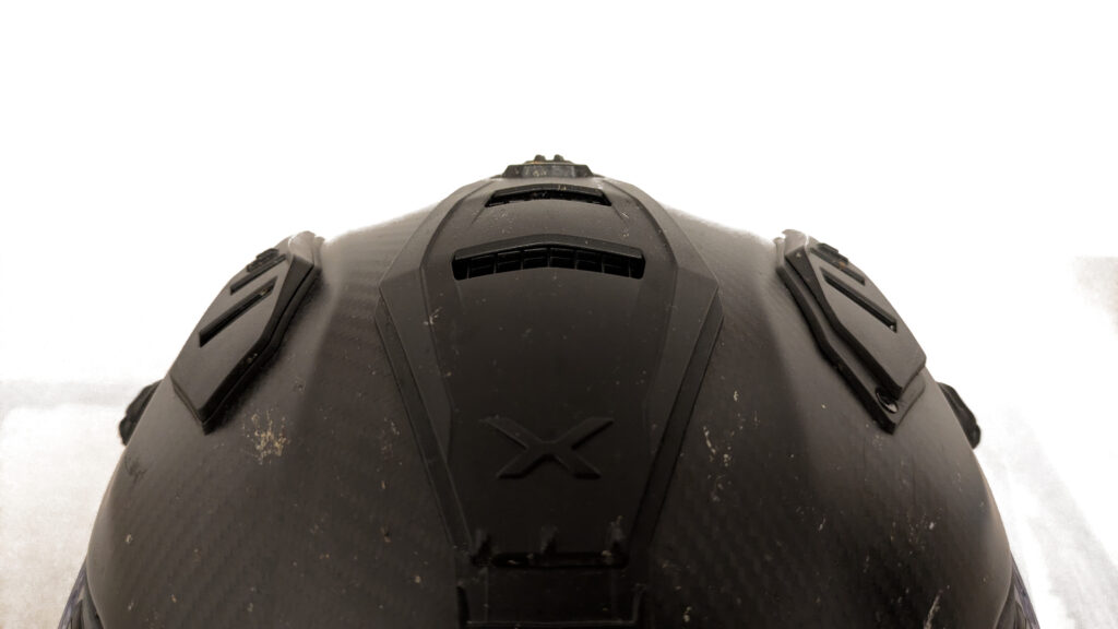 How to Choose the Right Motorcycle Helmet for Touring Close-up of adjustable intake vents on a motorcycle touring helmet